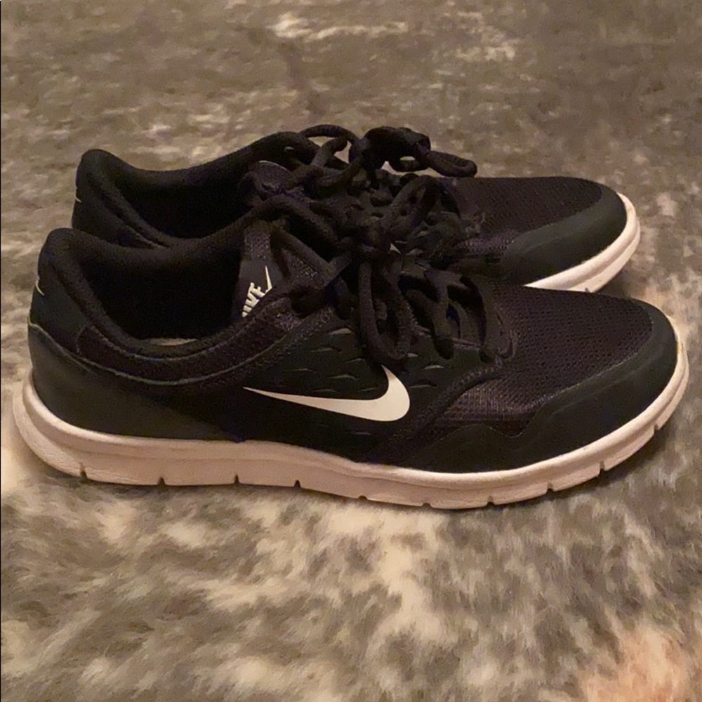 Nike black and white running shoes size 6.